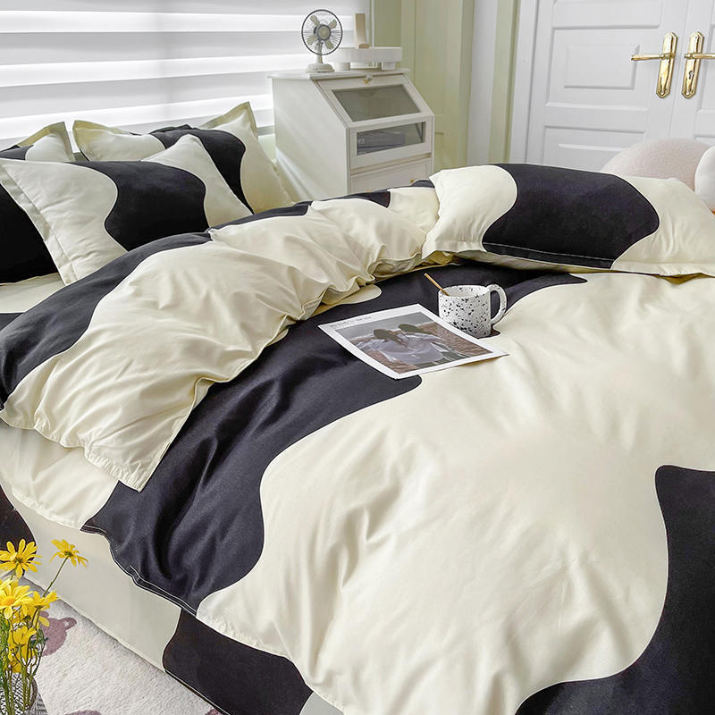 Side view of the VibeCore Aesthetic Monochrome Wave Duvet Cover Set, showcasing the bold black and white wave pattern on soft, premium fabric, perfect for adding modern, minimalist style to your bedroom or dorm decor.
