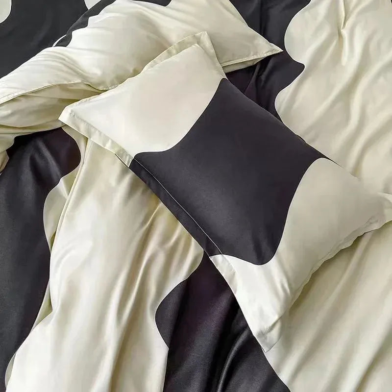 Close-up view of the VibeCore Aesthetic Monochrome Wave Duvet Cover Set pillowcase, featuring a stylish black and white wave pattern on soft, breathable fabric that complements the set’s modern, minimalist design.