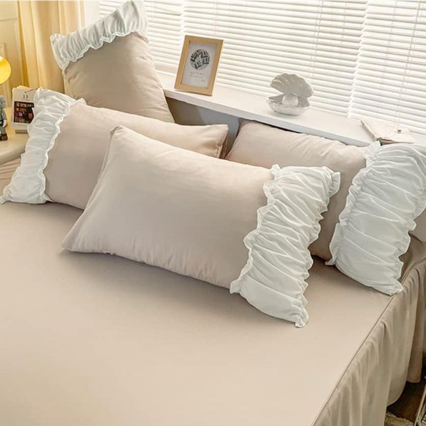 Close-up of the VibeCore Aesthetic Pastel Coquette Beige Pillowcase, showcasing its soft, breathable fabric and minimalist design, perfect for a cozy, stylish bedroom aesthetic.