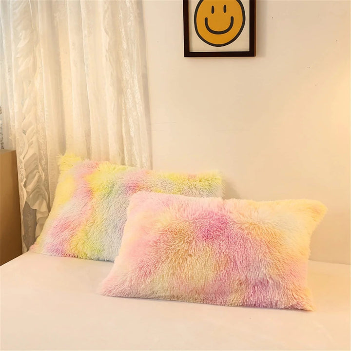 Close-up of pillowcases from the VibeCore Rainbow Fluffy Bedding Set in a gradient soft pink and yellow Ice Cream color, made with ultra-soft plush fabric that adds cozy luxury to your bedroom or dorm. The pastel Ice Cream color complements the vibrant bedding set, creating a playful and soothing atmosphere with plush comfort.