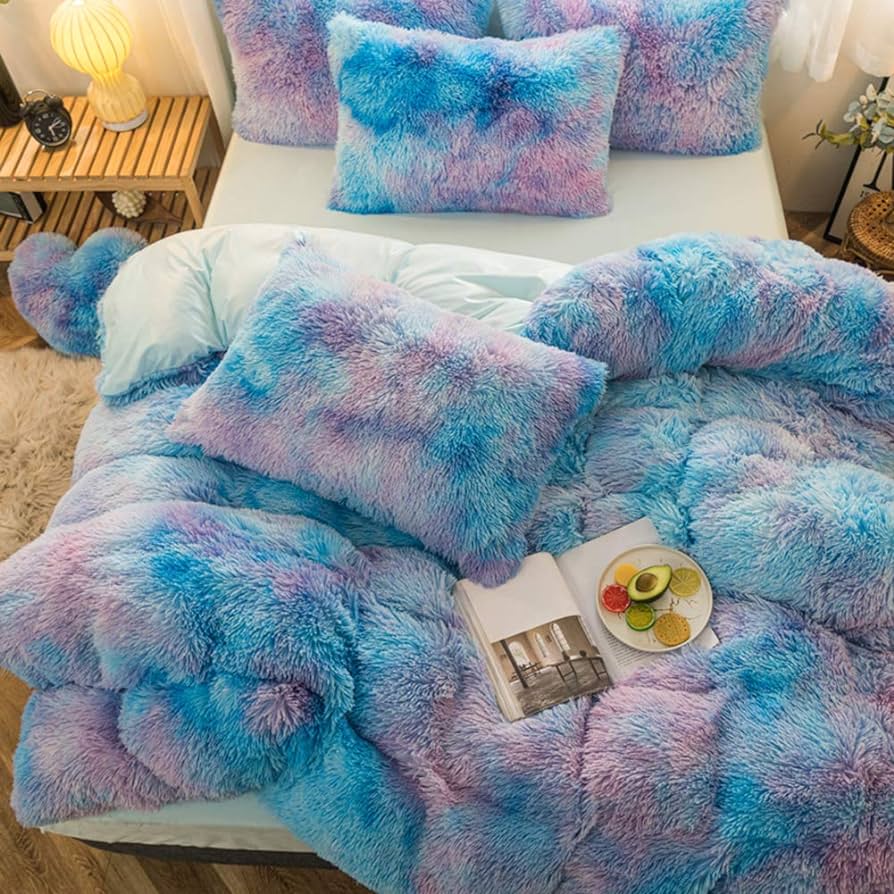 Aerial close-up view of the VibeCore Rainbow Fluffy Bedding Set in blue and purple Mystic color, highlighting the plush, ultra-soft fabric that offers exceptional comfort and warmth. The vibrant Mystic color adds a modern, playful touch to your bedroom or dorm, creating a cozy and inviting atmosphere with luxurious texture and style.