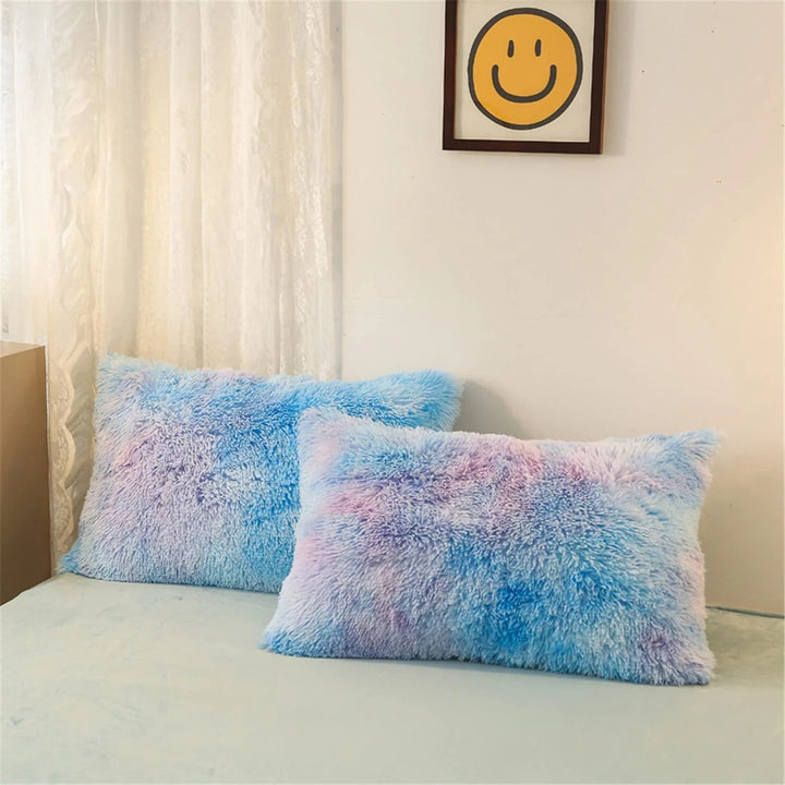 Close-up of pillowcases from the VibeCore Rainbow Fluffy Bedding Set in blue and purple Mystic colors, made from ultra-soft plush fabric for a cozy and luxurious sleep experience. These vibrant, plush pillowcases complement the colorful bedding set, adding a touch of comfort and style to your bedroom or dorm.