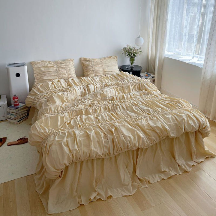 Aerial view of the VibeCore Royal Pleated Bedding Set, showcasing its luxurious 100% cotton fabric, romantic pleated details, and soft, breathable design that adds a chic, elegant vibe to any bedroom or dorm.