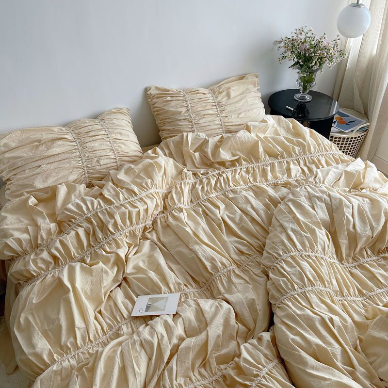Close-up aerial view of the VibeCore Royal Pleated Bedding Set, highlighting the intricate pleated details and luxurious 100% cotton fabric, offering a soft and chic addition to any bedroom or dorm.
