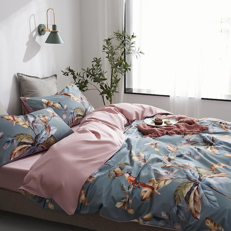 Side view of the VibeCore Aesthetic Satin Flower Language Duvet Cover Set, showcasing the luxurious satin texture and delicate floral design. Crafted from soft, silky fabric, this duvet cover set adds a sophisticated and cozy touch to any bedroom or dorm.