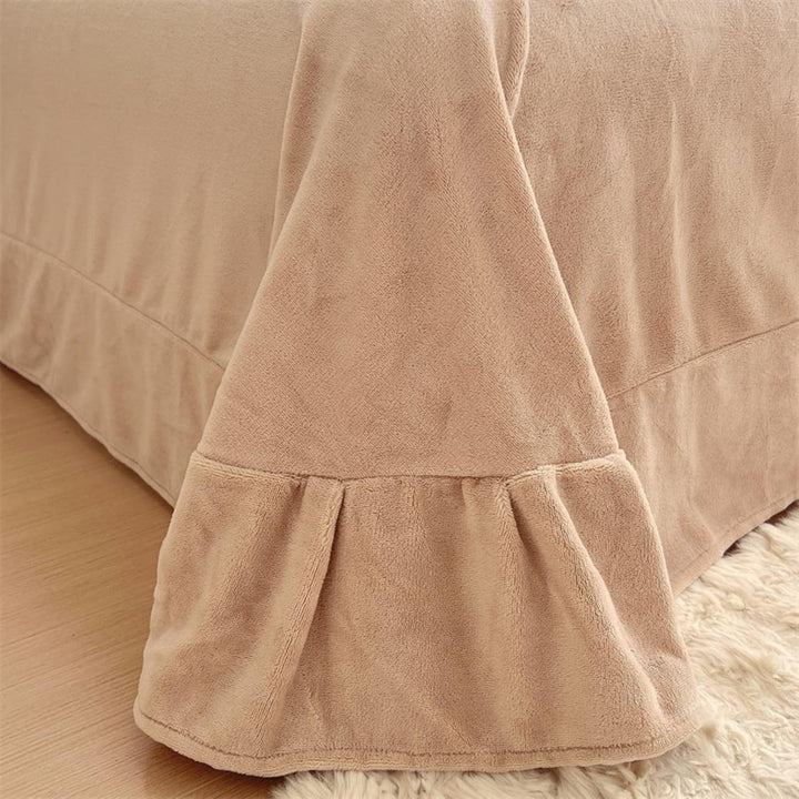 Close-up of the plush sheet in the VibeCore Snuggle Supreme Bedding Set in white, showcasing its ultra-soft, breathable fabric for added comfort and luxury.