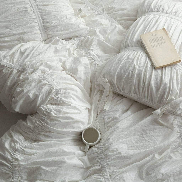 Close-up of the detailed pleating and luxurious texture on the VibeCore White Timeless Elegance Pleated Bedding Set, showcasing the elegant craftsmanship and refined design.
