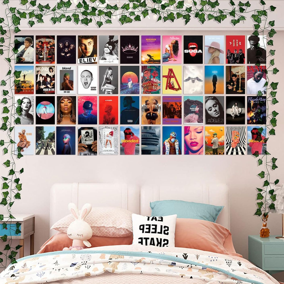 VibeCore Album Cover Poster Wall Collage Kit displayed above bed, creating a stylish and trendy bedroom decor with music-inspired art prints.