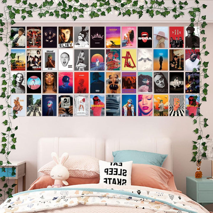 VibeCore Album Cover Poster Wall Collage Kit displayed above bed, creating a stylish and trendy bedroom decor with music-inspired art prints.