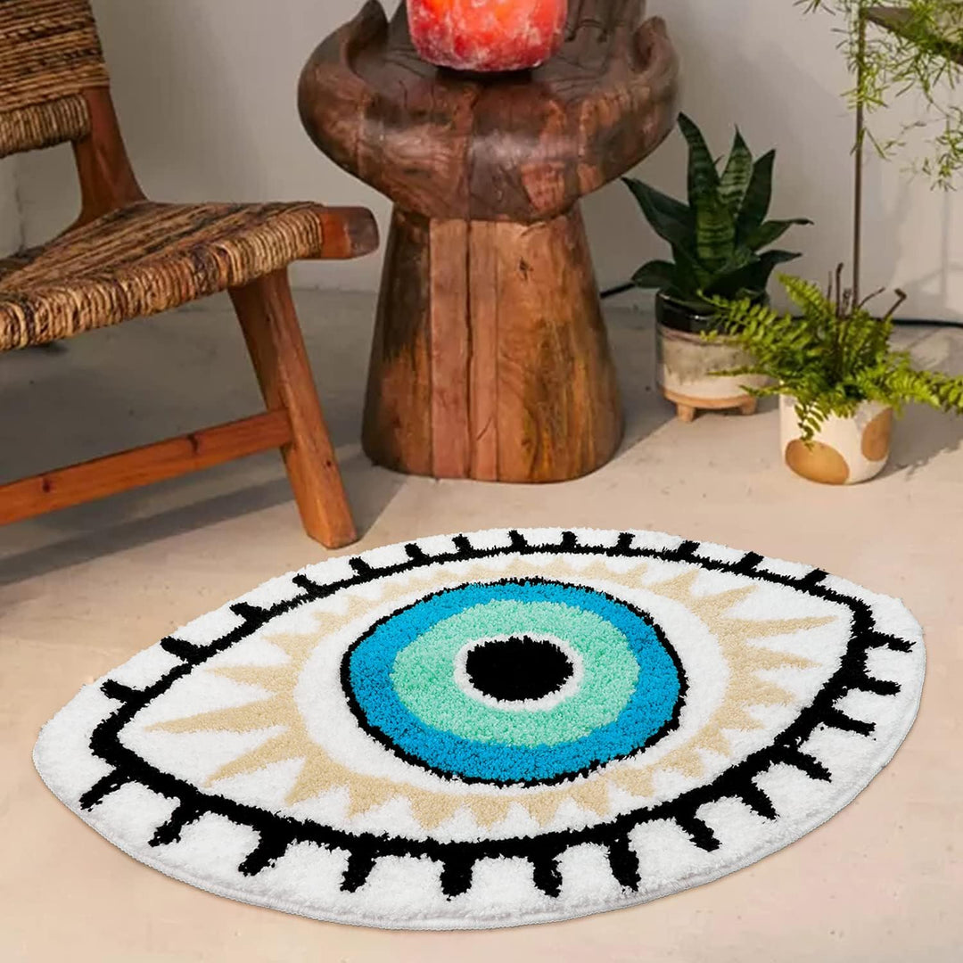 VibeCore All Seeing Eye Accent Rug showcasing the captivating evil eye design. This mystical, spiritual rug adds unique, bold decor to bedrooms, living rooms, and hallways. Featuring a plush texture, non-slip bottom, and durability, this eye-catching rug complements modern, urban, and mystical spaces, bringing an aura of protection and mystery to any room.