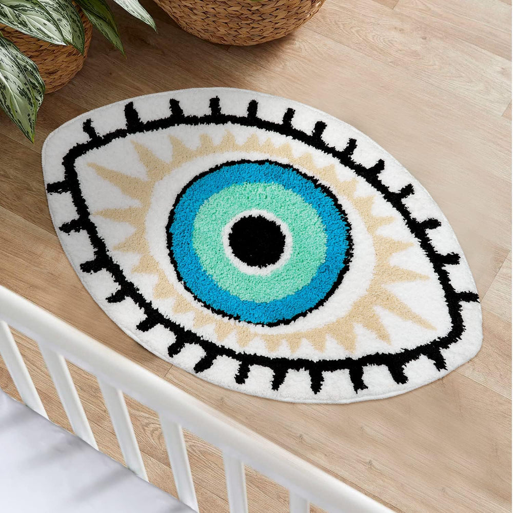 VibeCore All Seeing Eye Accent Rug with mystical eye design, perfect for adding spiritual vibes to any space. This bold, urban rug enhances modern bedrooms, living rooms, and dorms. Featuring a plush texture, non-slip backing, and easy-to-clean durability, it brings protection and uniqueness to your decor, offering a captivating addition to your home.