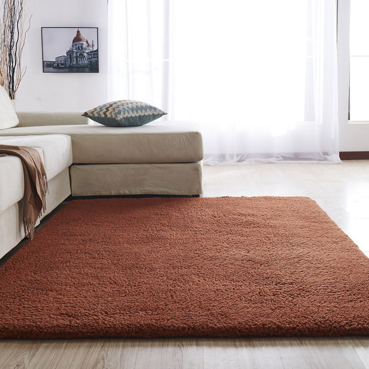 VibeCore Arctic Faux Cashmere Area Rug in coffee, made from soft faux cashmere for a plush feel. Non-slip backing for safety, ideal for bedrooms, living rooms, or dorms. Durable, easy to clean, and available in 11 color options.