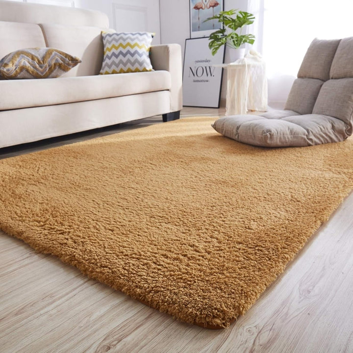 VibeCore Arctic Faux Cashmere Area Rug in khaki, close-up view in a living room, highlighting its soft faux cashmere texture and non-slip backing. Adds warmth and luxury to your space, perfect for enhancing comfort and style. Easy to clean and available in 11 color options.