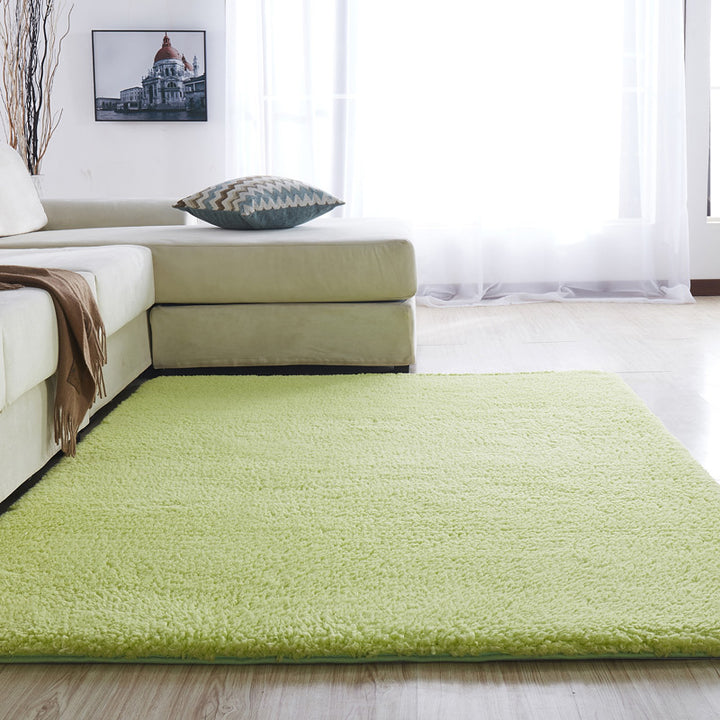 VibeCore Arctic Faux Cashmere Area Rug in matcha green, made from soft faux cashmere for a plush feel. Non-slip backing for safety, ideal for bedrooms, living rooms, or dorms. Durable, easy to clean, and available in 11 color options.