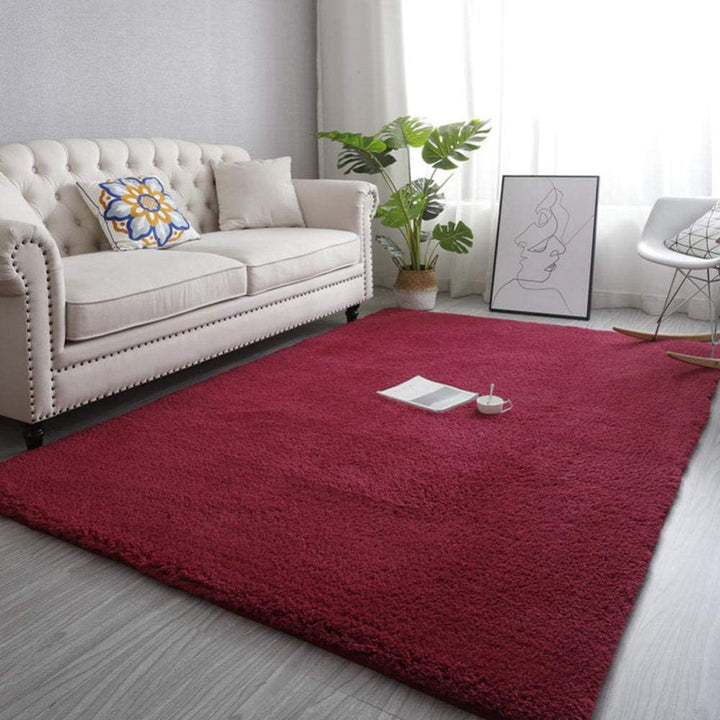 VibeCore Arctic Faux Cashmere Area Rug in red wine, made from soft faux cashmere for a plush feel. Non-slip backing for safety, ideal for bedrooms, living rooms, or dorms. Durable, easy to clean, and available in 11 color options.