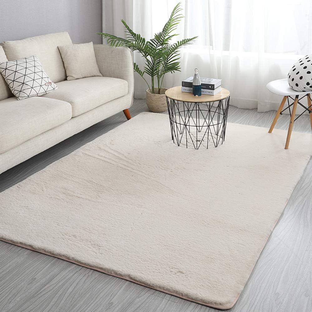 VibeCore Arctic Faux Cashmere Area Rug in white, made from soft faux cashmere for a plush feel. Non-slip backing for safety, ideal for bedrooms, living rooms, or dorms. Durable, easy to clean, and available in 11 color options.