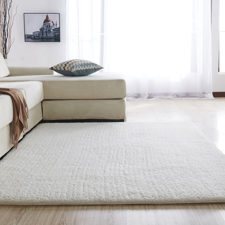 VibeCore Arctic Faux Cashmere Area Rug in white, close-up view showcasing its soft faux cashmere texture. Non-slip backing for safety, perfect for adding luxury and comfort to any room. Easy to clean and available in 11 color options