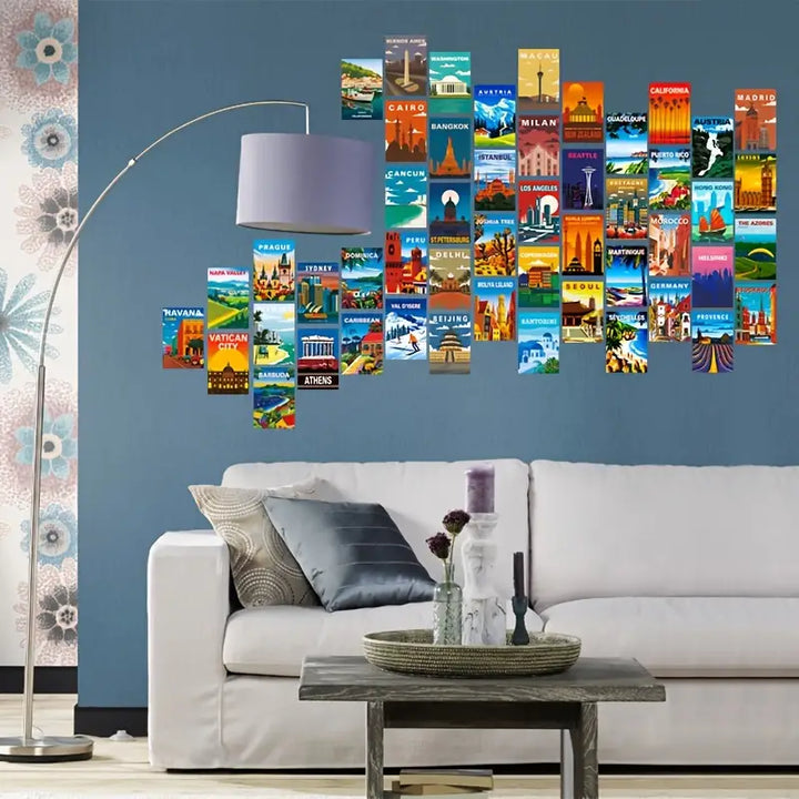 VibeCore Around the World Wall Collage Kit displayed above a couch, featuring 70 vibrant prints from iconic travel destinations. Brings wanderlust and cultural flair to the living space.