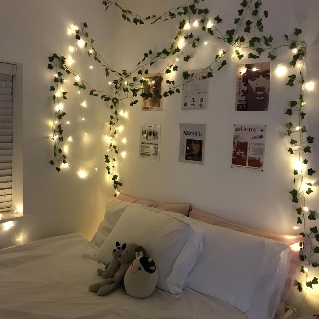 VibeCore Artificial Vine Garland Bundle above a bed, featuring lush fake ivy vines that bring vibrant greenery and a calming, natural vibe to the space. Perfect for draping above the bed or along the wall, these flexible, low-maintenance vines add a cozy, boho touch to your room decor.