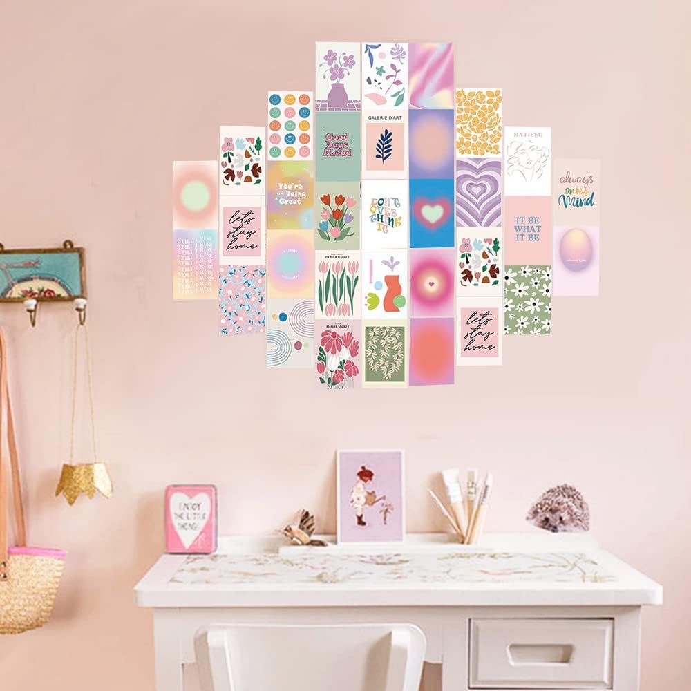 VibeCore Artsy Good Vibes Wall Collage Kit above desk featuring 70 uplifting pastel prints and vibrant Danish-inspired designs. Perfect for adding positive vibes, artsy decor, feel-good wall art, workspace inspiration, and a cheerful atmosphere to your desk area.