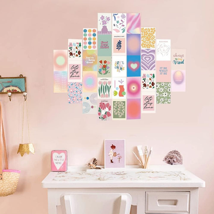 VibeCore Artsy Good Vibes Wall Collage Kit above desk featuring 70 uplifting pastel prints and vibrant Danish-inspired designs. Perfect for adding positive vibes, artsy decor, feel-good wall art, workspace inspiration, and a cheerful atmosphere to your desk area.