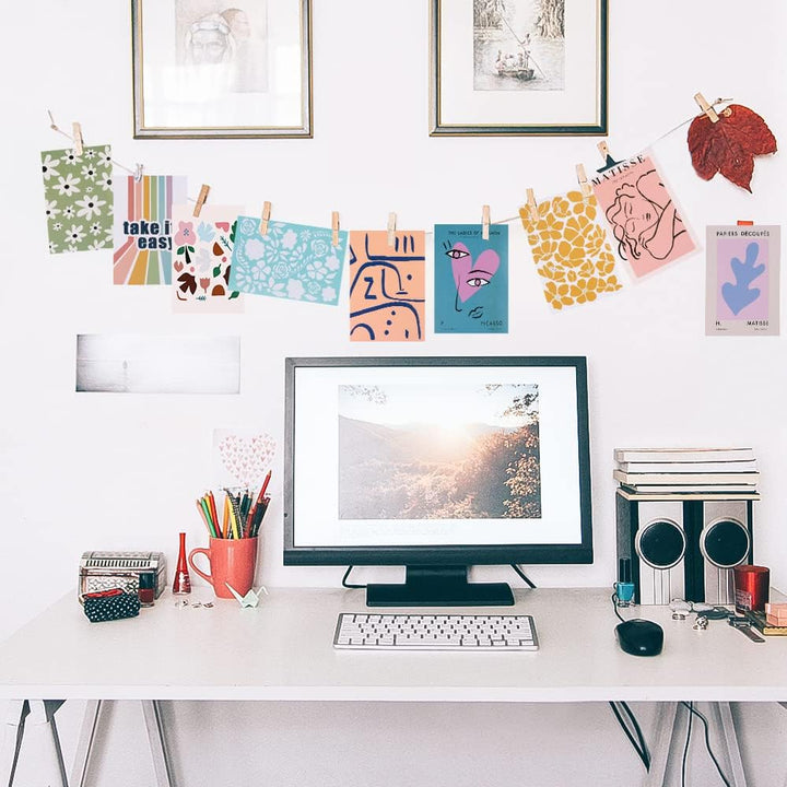 VibeCore Artsy Good Vibes Wall Collage Kit in office featuring 70 uplifting pastel prints and vibrant Danish-inspired designs. Perfect for creating a positive, artsy atmosphere, feel-good office decor, and inspiring workspace with cheerful, vibrant wall art.