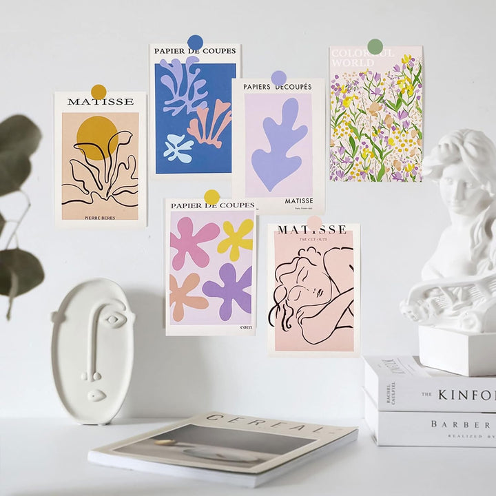 VibeCore Artsy Good Vibes Wall Collage Kit on wall featuring 70 uplifting pastel prints and vibrant Danish-inspired designs. Ideal for transforming any room with positive vibes, artsy decor, feel-good wall art, and cheerful pastel accents that brighten up the space.