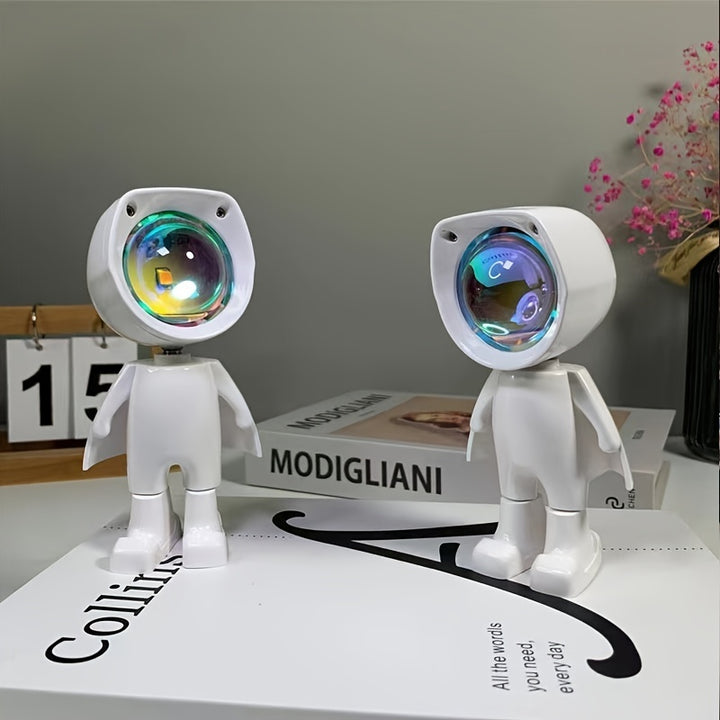 VibeCore Astronaut Sunset Light body, featuring a sleek, futuristic design with 360° adjustability. The lamp projects warm sunset hues, adding celestial vibes to any space. Perfect for aesthetic, cutecore, coquette, teen rooms, dorm rooms, celestial decor, mood lighting, and cozy spaces.