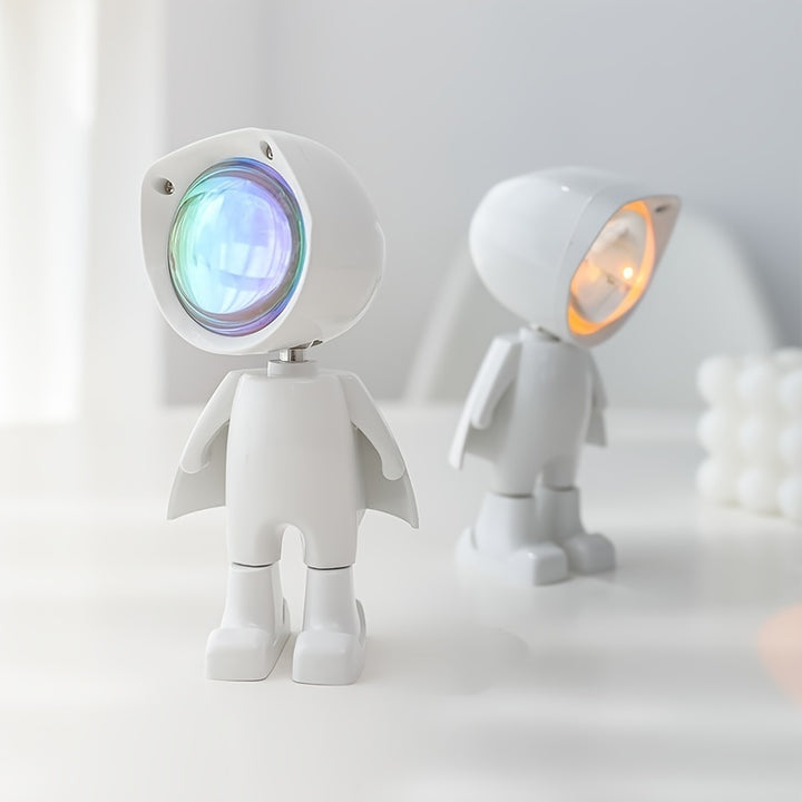 VibeCore Astronaut Sunset Light on in daylight, showcasing its warm sunset hues and futuristic design. The lamp’s 360° adjustable projection adds a celestial glow to your space, perfect for aesthetic, cutecore, coquette, teen rooms, dorm rooms, mood lighting, and cozy vibes, even during the day.