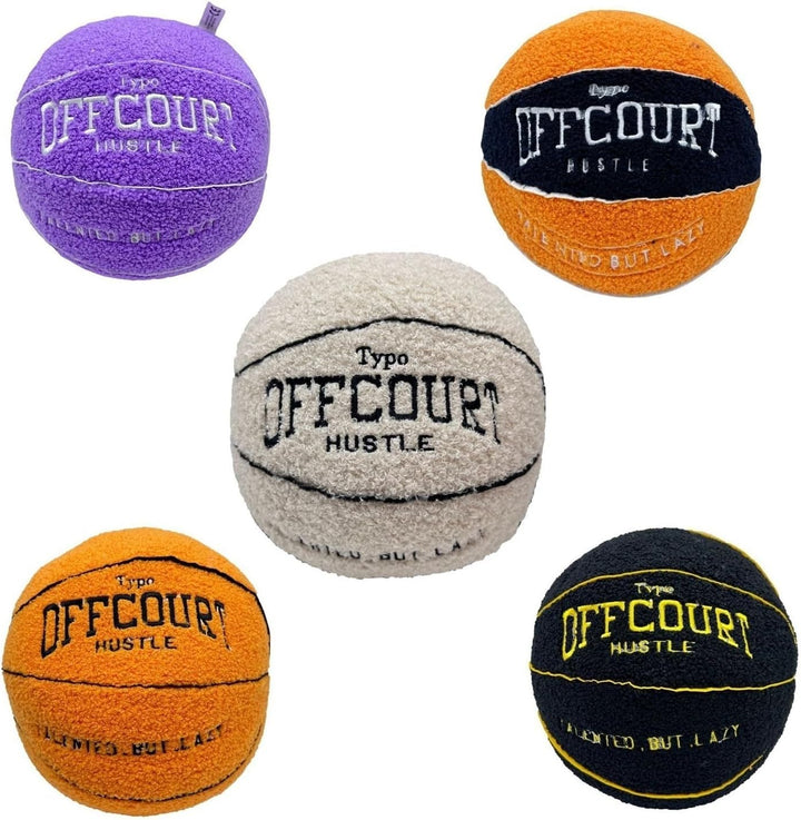 Set of five round basketball decorative pillows in orange, black, purple, white, and black & orange, displayed together. Sporty throw pillows for dorms, teen bedrooms, or apartments, adding a game-inspired aesthetic.