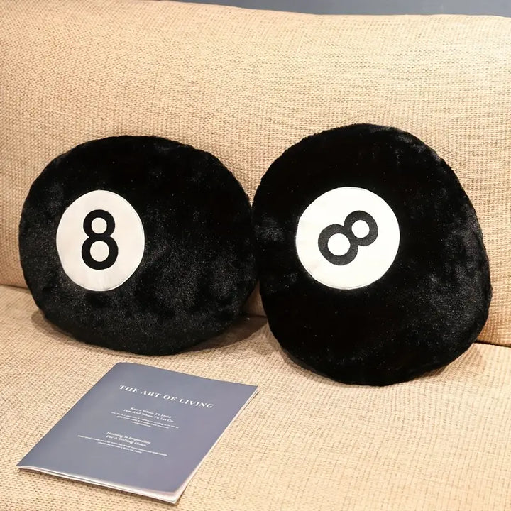 VibeCore Billiard Ball Throw Pillows featuring bold magic 8 ball design, placed on a couch. Soft, plush fabric pillows adding a playful, trendy touch to any room, ideal for game rooms, dorms, or bedrooms.