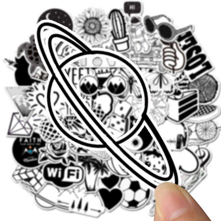 Close-up of a VibeCore Black and White Sticker featuring a minimalist Saturn design, adding a sleek, modern touch with a timeless monochrome aesthetic.