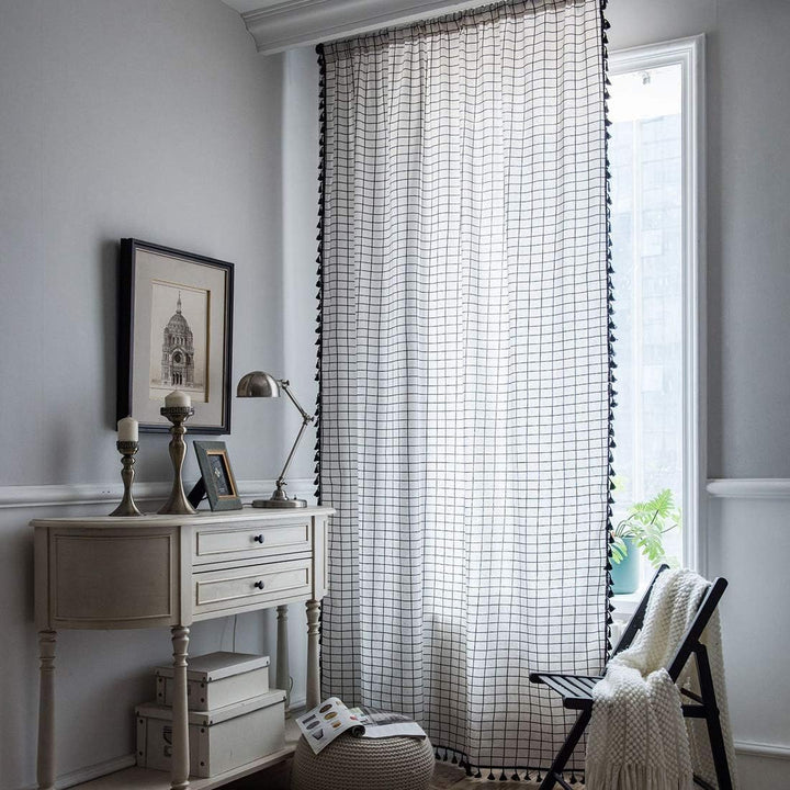 VibeCore Black & White Grid Tassel Linen Curtain, featuring a bold grid pattern with playful tassels, light-filtering and semi-blackout design, crafted from a soft and durable cotton-linen blend for a chic, bohemian touch.