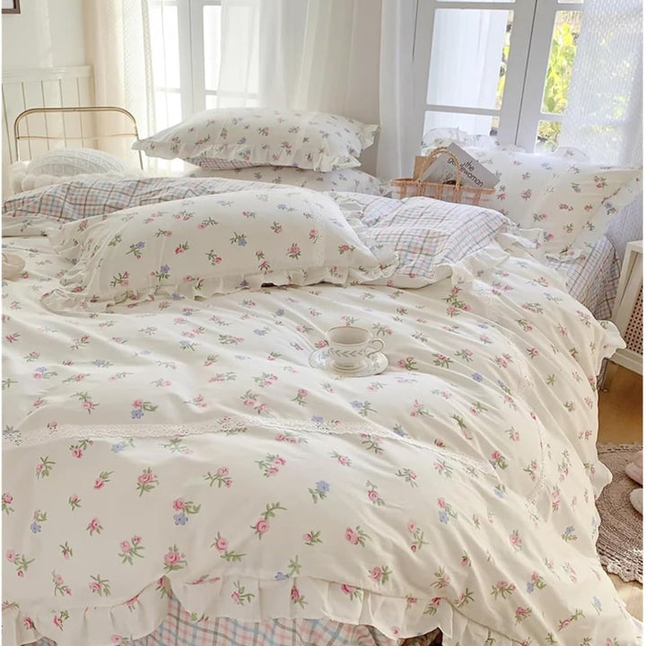 VibeCore Blossom French Ruffles Duvet Cover Set by window, featuring soft cotton fabric, delicate ruffles, and a romantic floral design for an elegant bedroom refresh.