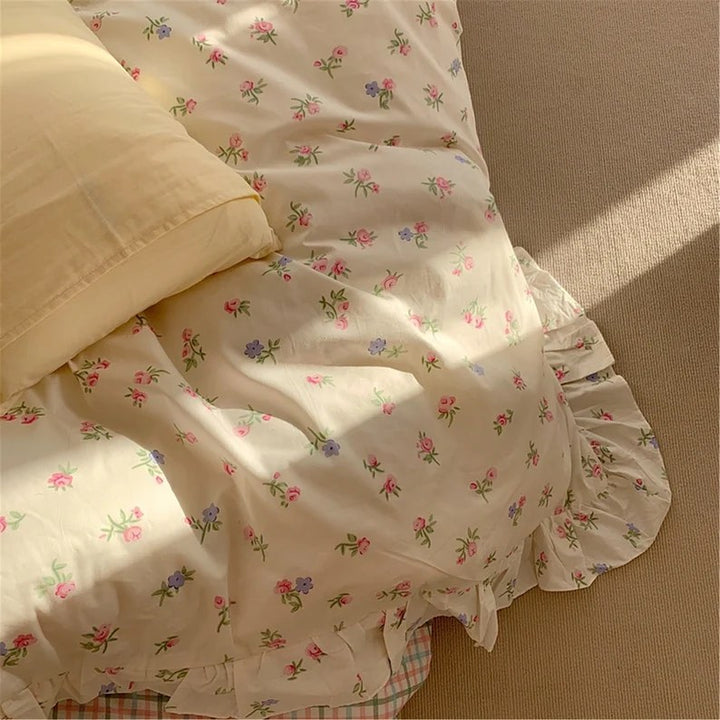 VibeCore Blossom French Ruffles Duvet Cover Set close-up, top view of corner highlighting the intricate ruffle details and soft cotton fabric.