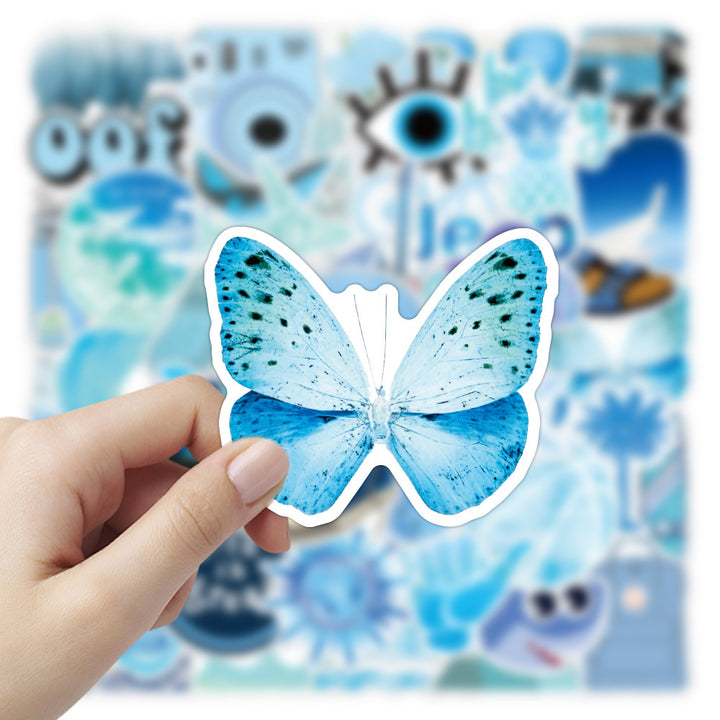 VibeCore Blue Vibes Stickers close-up of a blue butterfly sticker. Features vibrant blue aesthetic and calming design, perfect for personalizing laptops, phones, and accessories.