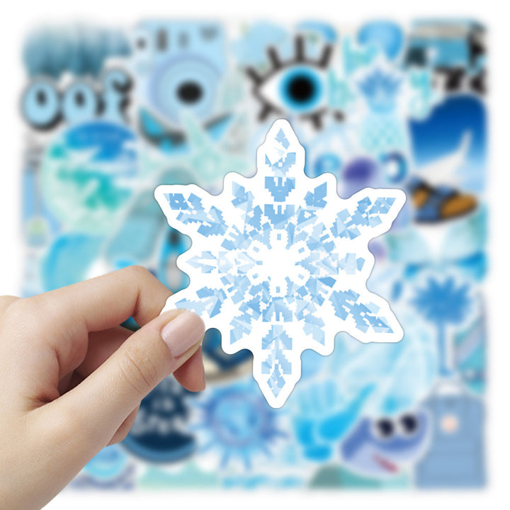 VibeCore Blue Vibes Stickers close-up of a blue snowflake sticker. Features vibrant blue aesthetic and cool design, perfect for personalizing laptops, phones, and water bottles.