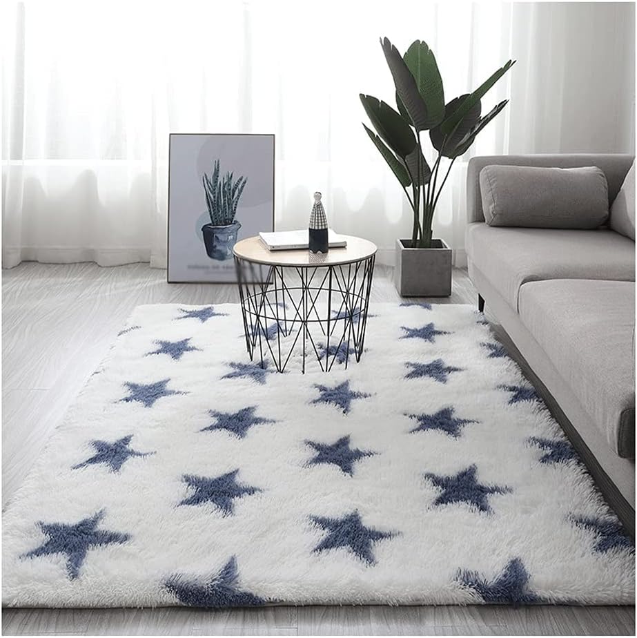 VibeCore Blue & White Stars Area Rug in Living Room with soft, fluffy texture and non-slip backing. Perfect for adding a celestial vibe to any space. Durable and easy to clean. Ideal for high-traffic areas.