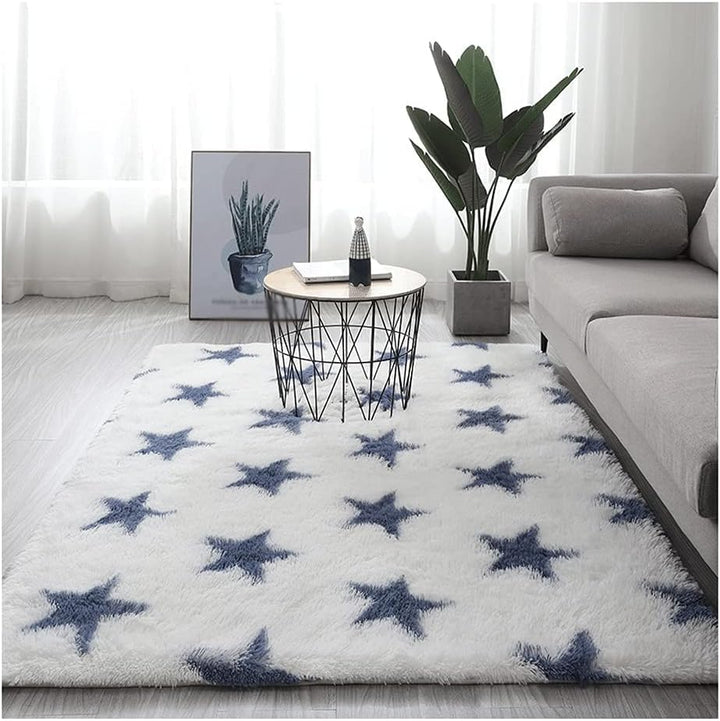 VibeCore Blue & White Stars Area Rug in Living Room with soft, fluffy texture and non-slip backing. Perfect for adding a celestial vibe to any space. Durable and easy to clean. Ideal for high-traffic areas.