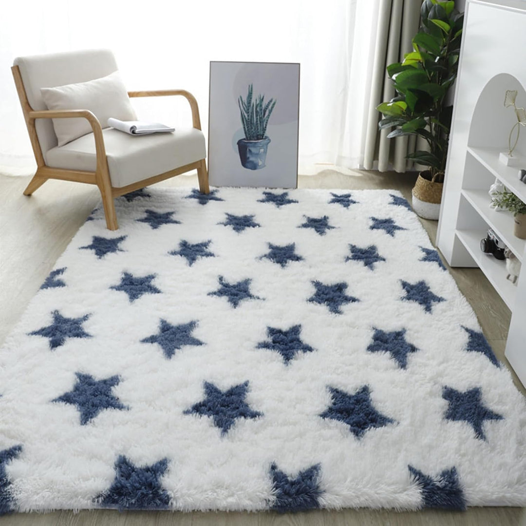 VibeCore Blue & White Stars Area Rug on floor with starry design, soft texture, and non-slip backing. Adds a celestial touch to any room while providing comfort and safety.
