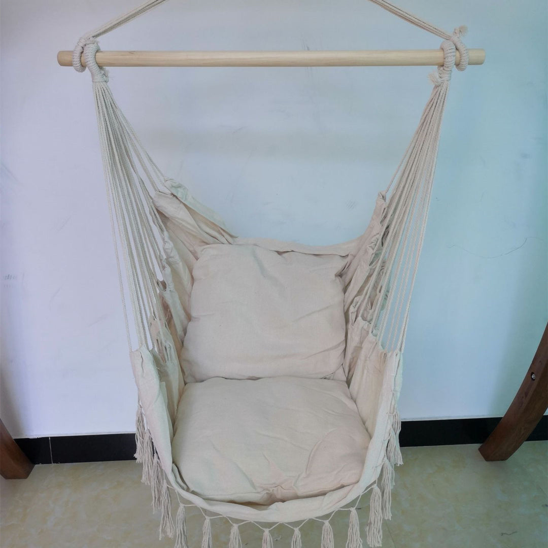 Aesthetic Bohemia style hanging hammock chair showcasing its high-quality cotton thread design perfect for adding a cozy, bohemian touch to any space while offering durable comfort for lounging or reading.