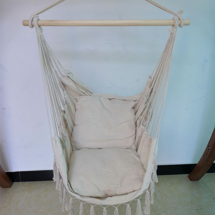 Aesthetic Bohemia style hanging hammock chair showcasing its high-quality cotton thread design perfect for adding a cozy, bohemian touch to any space while offering durable comfort for lounging or reading.
