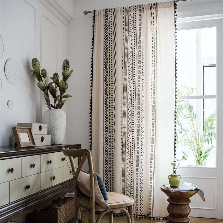 VibeCore Bohemian Black Pattern Linen Curtain, 100% linen cotton, intricate boho design, light filtering with privacy, soft fabric with tassel details, durable and machine washable, perfect for adding boho charm to your space.