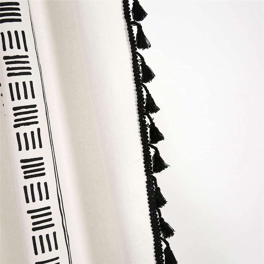 VibeCore Bohemian Black Pattern Linen Curtain Close Up, 100% linen cotton, intricate boho design, soft fabric with tassel details, durable and machine washable, perfect for enhancing your space with boho chic vibes.
