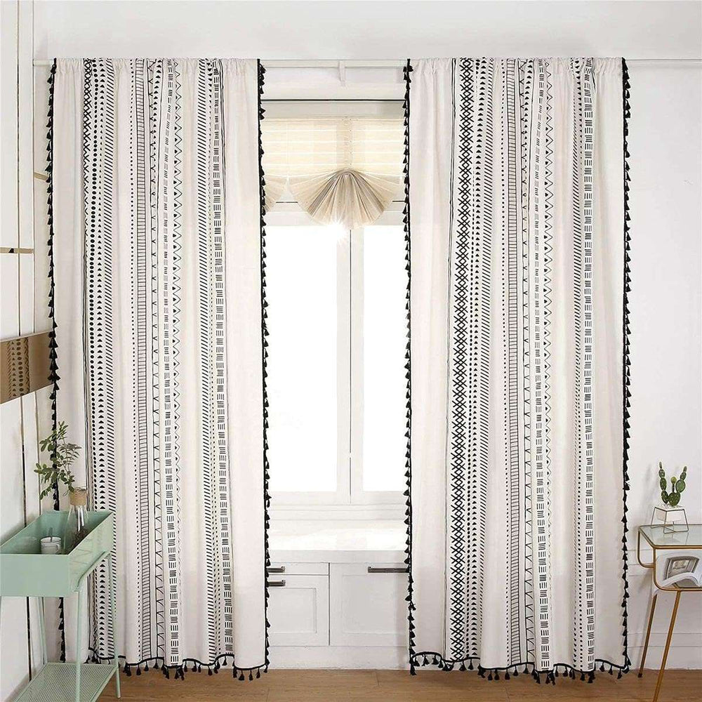 VibeCore Bohemian Black Pattern Linen Curtain on Living Room Window, 100% linen cotton, intricate boho design, light filtering with privacy, soft fabric with tassel details, perfect for adding boho charm and sophistication to your space.