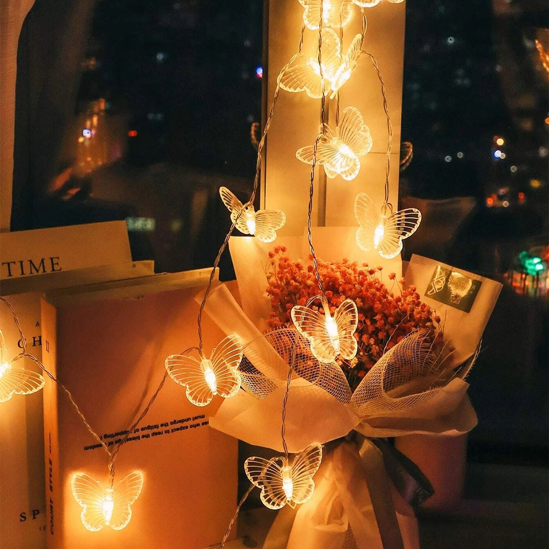 VibeCore Butterfly String Lights hanging gracefully, adding a whimsical glow to a bedroom or dorm with delicate butterfly designs.