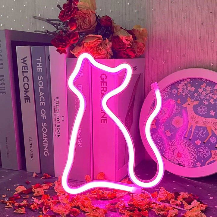 VibeCore Cat Neon Light Pink Against Books