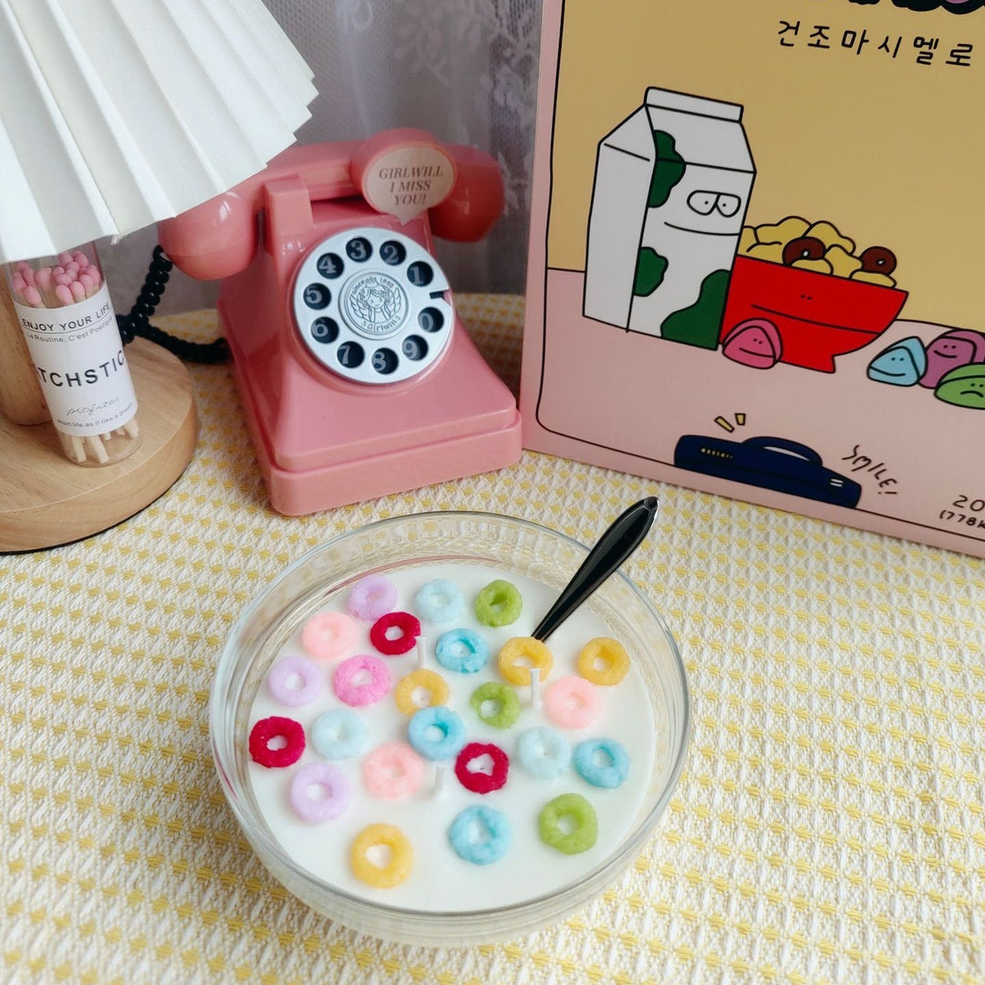 VibeCore Cereal Bowl Candle featuring pastel-colored Fruit Loops made of wax, set in a creamy soy wax base inside a realistic cereal bowl.