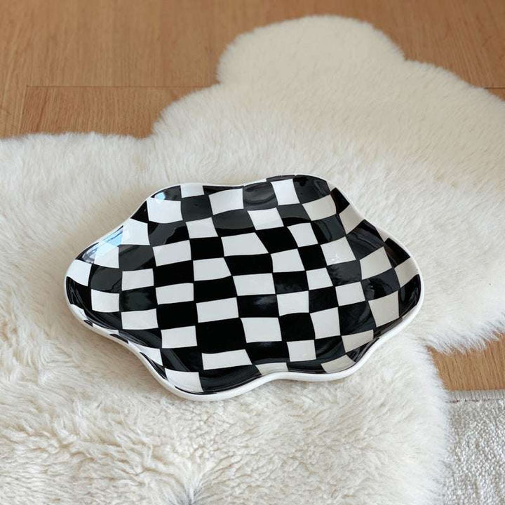 Aesthetic checkerboard display tray in black featuring a striking hand-painted porcelain design perfect for adding modern simplicity to any space versatile for serving or display.