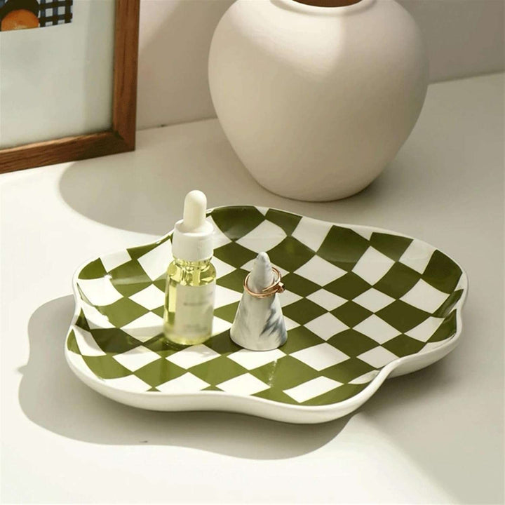 Aesthetic checkerboard display tray in green used as a small accessory tray featuring a striking hand-painted porcelain design perfect for organizing jewelry, keys, or small items while adding modern simplicity to your space.